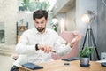 Young Man Sitting in the Restaurant Meeting Concept Royalty Free Stock Photo