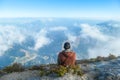 Bajawa - A man sitting on the top of the volcano, admiring the view