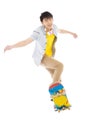 Young man Skateboard to jump isolated on white background Royalty Free Stock Photo