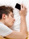 Man sleep with a Phone Royalty Free Stock Photo