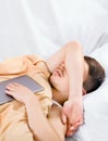 Young Man sleep with a Tablet Royalty Free Stock Photo