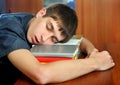 Young Man sleep on the Books Royalty Free Stock Photo