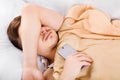 Young Man sleep with a Phone Royalty Free Stock Photo