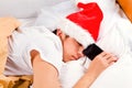 Young Man sleep in Santa Hat Royalty Free Stock Photo