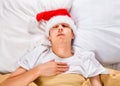 Young Man sleep in Santa Hat