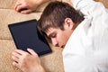 Young Man sleep with a Tablet Royalty Free Stock Photo