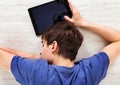 Young Man sleep with a Tablet Royalty Free Stock Photo