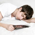 Young Man sleep with Tablet Royalty Free Stock Photo