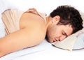 Young man sleeping in bed Royalty Free Stock Photo