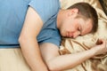 Young man sleeping in bed Royalty Free Stock Photo