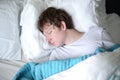 Young Man Sleeping in Bed Royalty Free Stock Photo