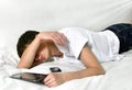 Young Man sleeps with Tablet Computer Royalty Free Stock Photo