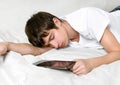 Young Man sleeps with Tablet Computer Royalty Free Stock Photo