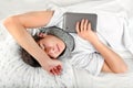 Young Man sleeps with Tablet Computer Royalty Free Stock Photo