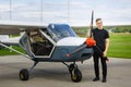 Young man in small plane cockpit Royalty Free Stock Photo