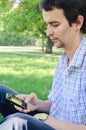 A young man with a smartphone