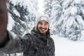 Young Man Smile Camera Taking Selfie Photo In Winter Snow Forest Guy Outdoors Royalty Free Stock Photo