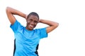 Young man smiling with hands behind head on isolated white background Royalty Free Stock Photo