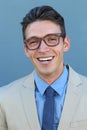 Young man smiling and looking at camera wearing glasses. Portrait of a happy handsome young man wearing spectacles Royalty Free Stock Photo