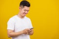 Young man smiling positive using smartphone to get in touch screen