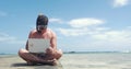 Man in snorkel using pad on pier