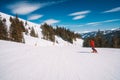 Young man snowboarding in the Austrian Alps, making different tricks Royalty Free Stock Photo