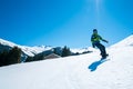 Young man snowboarding in the Austrian Alps Royalty Free Stock Photo