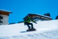Young man snowboarding in the Austrian Alps Royalty Free Stock Photo