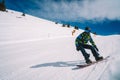 Young man snowboarding in the Austrian Alps Royalty Free Stock Photo