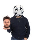 Young man with a soccer ball instead of the head Royalty Free Stock Photo