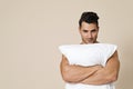 Young man with soft pillow Royalty Free Stock Photo