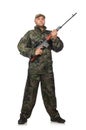 Young man in soldier uniform holding gun Royalty Free Stock Photo