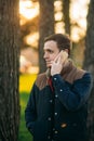 A young man speaks on his mobile phone. Business Royalty Free Stock Photo
