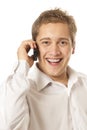 Young man speaks by a mobile phone Royalty Free Stock Photo