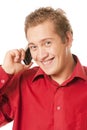 Young man speaks by a mobile phone Royalty Free Stock Photo