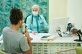 Young man during spirometry procedure in clinic