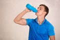 Young man squash player break rest in the gym Royalty Free Stock Photo