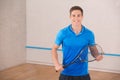Young man squash player exercise game in the gym Royalty Free Stock Photo