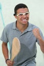 Young man squash player exercise game in gym Royalty Free Stock Photo