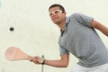 young man squash player exercise game in gym Royalty Free Stock Photo