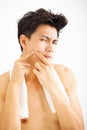 young man Squeezing pimple Royalty Free Stock Photo