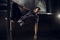 Young man on stairs over industrial background Royalty Free Stock Photo