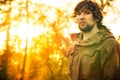 Young Man standing alone in forest outdoor Royalty Free Stock Photo