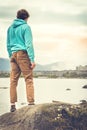 Young Man standing alone outdoor Travel Lifestyle Royalty Free Stock Photo