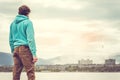 Young Man standing alone outdoor Travel Lifestyle Royalty Free Stock Photo