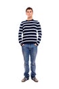 Young man standing firmly with hands in pockets Royalty Free Stock Photo