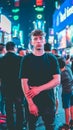 Young man standing in the middle of a bustling street in Toronto.