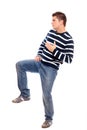 Young man standing on one leg Royalty Free Stock Photo
