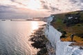 Young man standing on top of the White Cliffs of Dover. Royalty Free Stock Photo