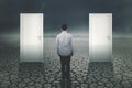 Young man standing with two doors Royalty Free Stock Photo